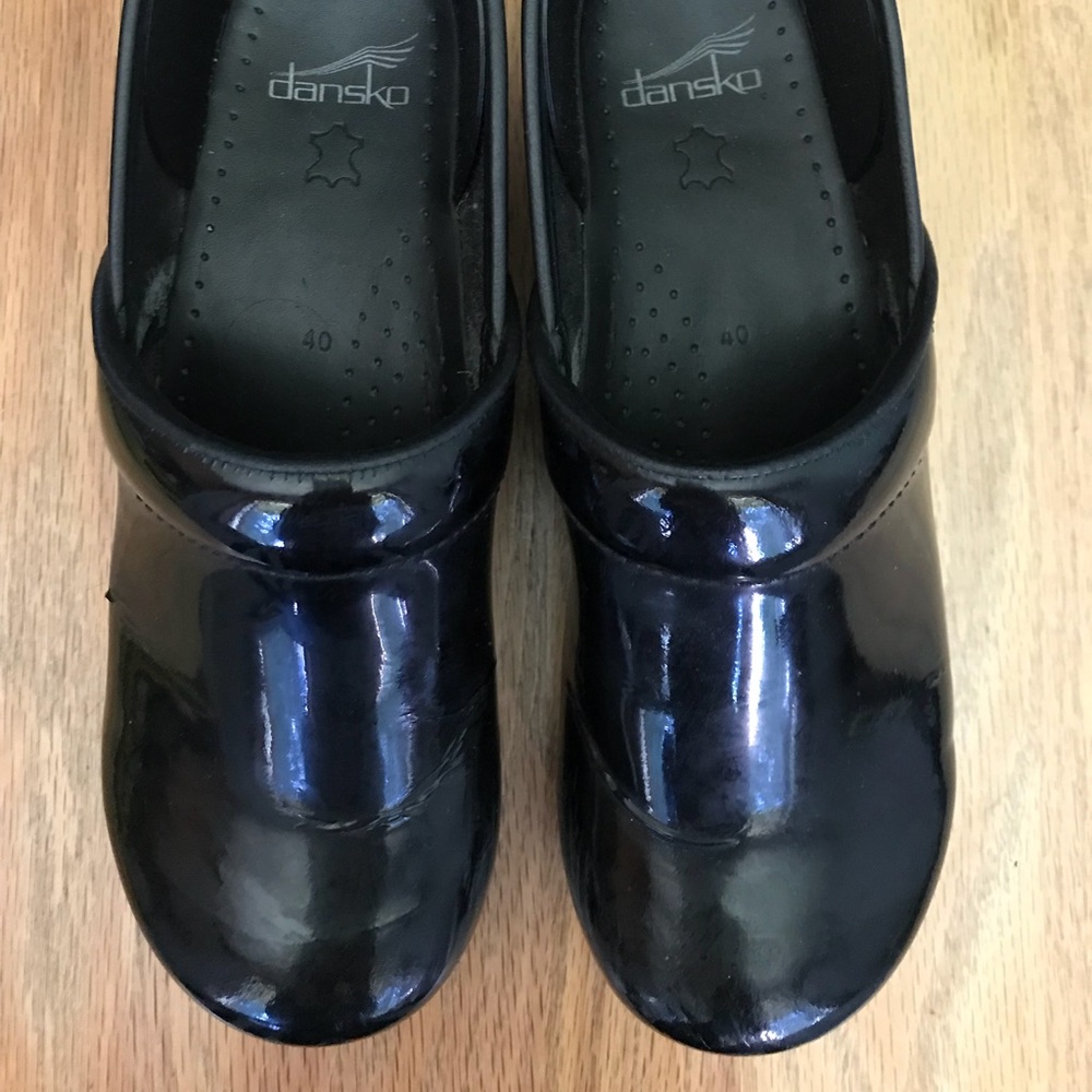 Dansko patent leather clogs